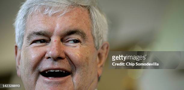 Republican presidential candidate, former House Speaker Newt Gingrich speaks during a campaign event at The Frederick Motor Company, a Ford auto...