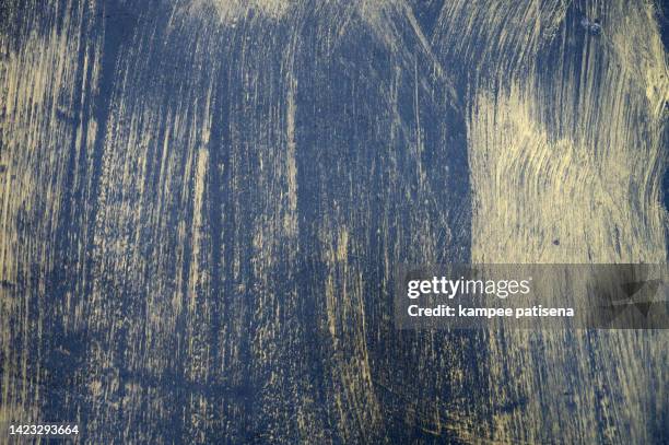 gold and dark blue painted on plastic - brushed gold background foto e immagini stock