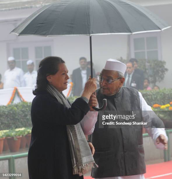 Congress President Sonia Gandhi arrives at a flag hoisting ceremony to mark Congress Party's foundation day at Congress party headquarters in New...