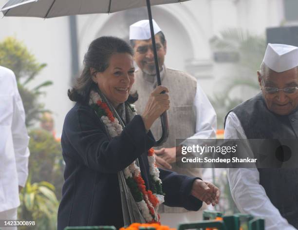 Congress President Sonia Gandhi arrives at a flag hoisting ceremony to mark Congress Party's foundation day at Congress party headquarters in New...