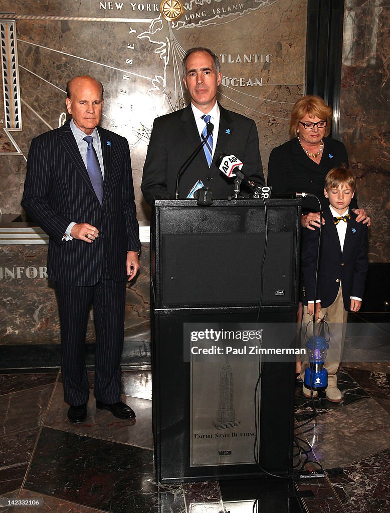 Tommy & Dee Hilfiger And Bob & Suzanne Wright Light The Empire State Building In Celebration Of World Autism Awareness