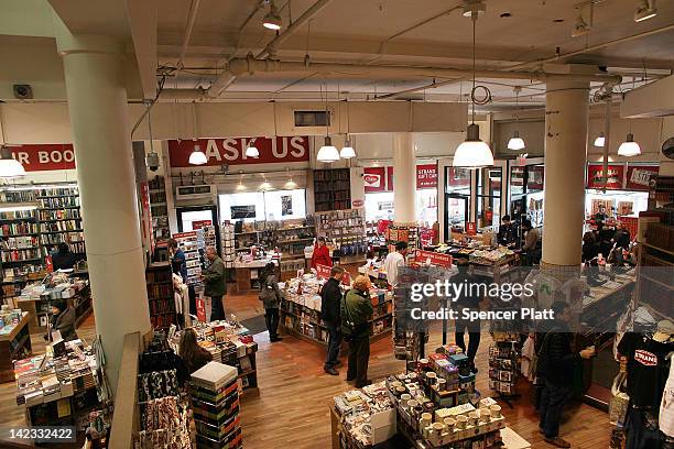 People shop in the Strand Bookstore on April 2, 2012 in New York City. Workers and owners of the Strand are in a contract dispute over healthcare...