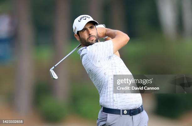 Adrian Otaegui of Spain plays his second shot on the ninth hole during the final round on day four of the BMW PGA Championship at Wentworth Golf Club...