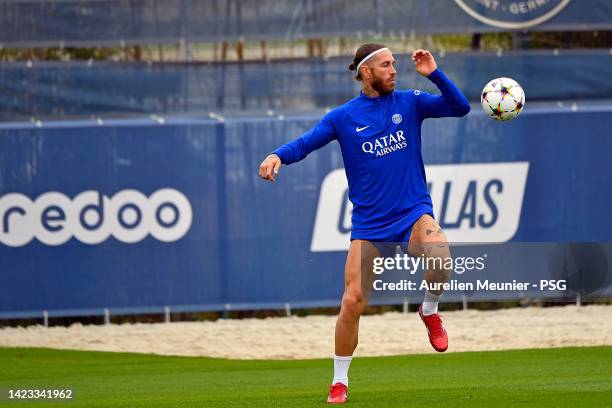 Sergio Ramos controls the ball during a Paris Saint-Germain training session ahead of their UEFA Champions League group H match against Maccabi Haifa...