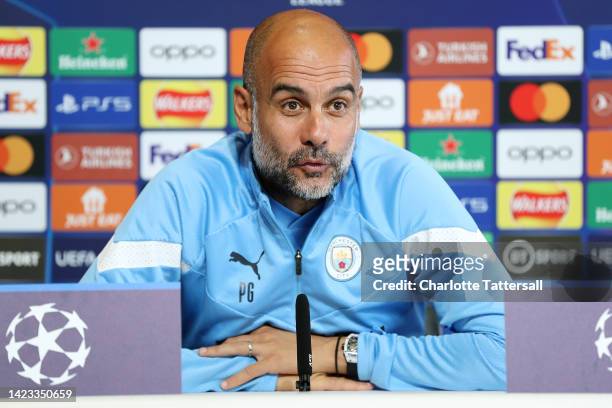 Pep Guardiola, Manager of Manchester City speaks during a press conference ahead of their UEFA Champions League group G match against Borussia...