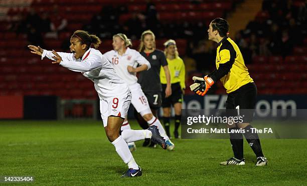 Nikita Parris of England celebrates her goal during the UEFA European Women's U19 Championship Qualifier match between England and Wales at Sincil...