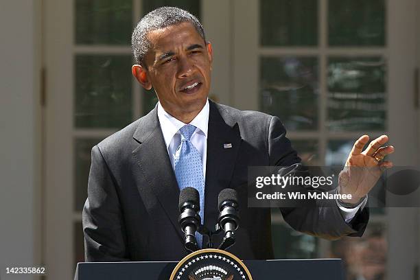 President Barack Obama answers a question on his health care legislation pending before the U.S. Supreme Court during a joint press conference with...