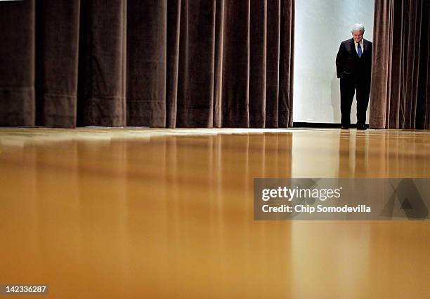 Republican presidential candidate, former House Speaker Newt Gingrich waits back stage to be introduced during a campaign town hall-style meeting at...