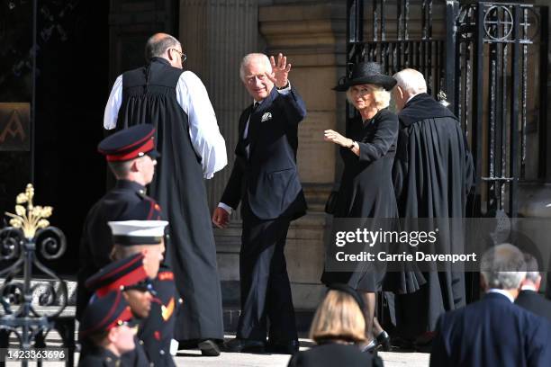 King Charles III and Camilla, Queen Consort, are seen arriving ahead of a service of reflection in memory of Queen Elizabeth II at St Anne's...