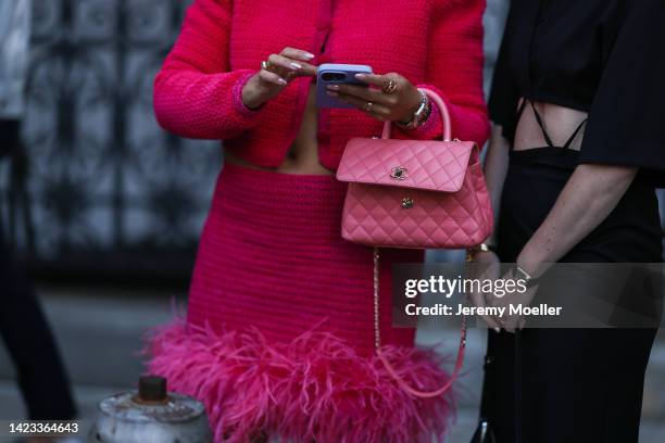 Janka Polliani seen wearing a pink dress and a chanel bag, outside PatBo Show during New York Fashion Week on September 10, 2022 in New York City.