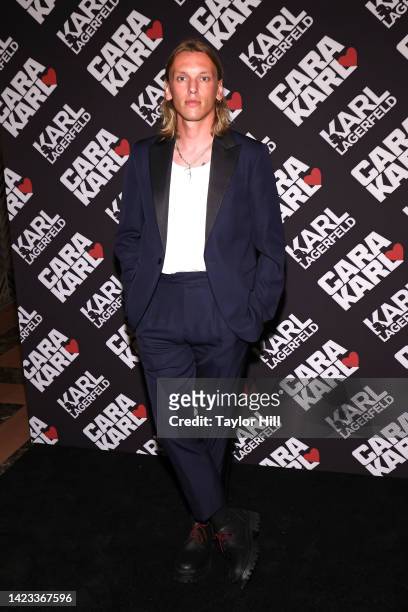 Jamie Campbell Bower attends a celebration of the "Cara Loves Karl" capsule collection at Saga on September 12, 2022 in New York City.