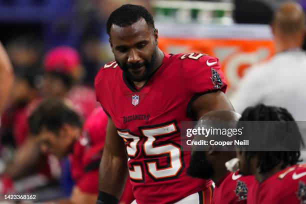 Giovani Bernard of the Tampa Bay Buccaneers speaks with teammates on the bench against the Dallas Cowboys at AT&T Stadium on September 11, 2022 in...
