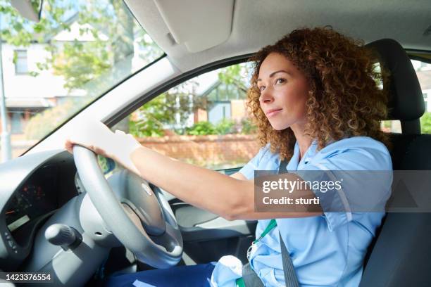 care nurse on the road - driver occupation stockfoto's en -beelden
