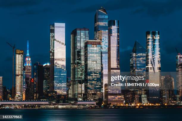 view of skyscrapers at night,hudson yards,united states,usa - new york skyline nacht stock-fotos und bilder