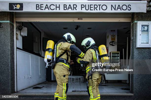 The technicians, Enrique Rodriguez and Jordana Rodriguez, work on the measurement of noxious gases in the coastal neighborhood of Puerto Naos, on 13...