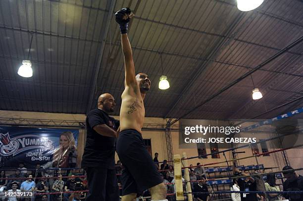 "Jagger" celebrates a victory in a fight during the Sambo -martial art created in the former Soviet Union for the defense of the soldiers- "Combat...