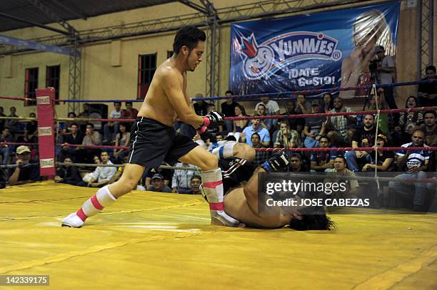 "The Master" and "The Teacher" take part in a fight during the Sambo -martial art created in the former Soviet Union for the defense of the soldiers-...