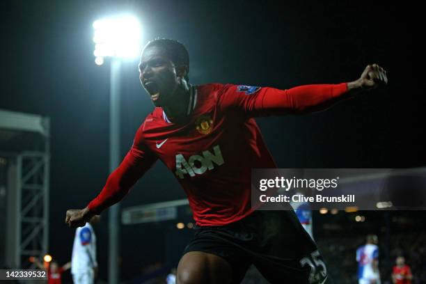 Antonio Valencia of Manchester United celebrates scoring the opening goal during the Barclays Premier League match between Blackburn Rovers and...