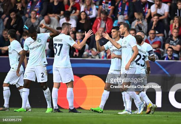 Edin Dzeko of FC Internazionale celebrates with team-mates after scoring the goal during the UEFA Champions League group C match between Viktoria...