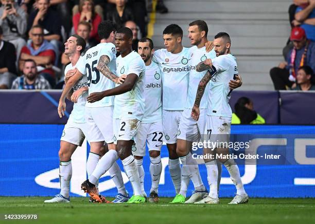 Edin Dzeko of FC Internazionale celebrates with team-mates after scoring the goal during the UEFA Champions League group C match between Viktoria...