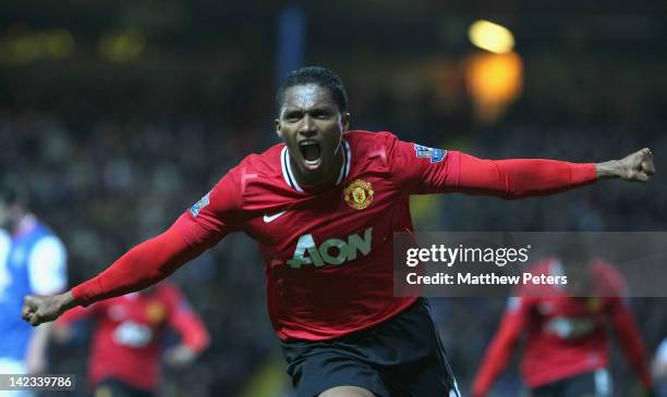 Antonio Valencia of Manchester United celebrates scoring their first goal during the Barclays Premier League match between Blackburn Rovers and...