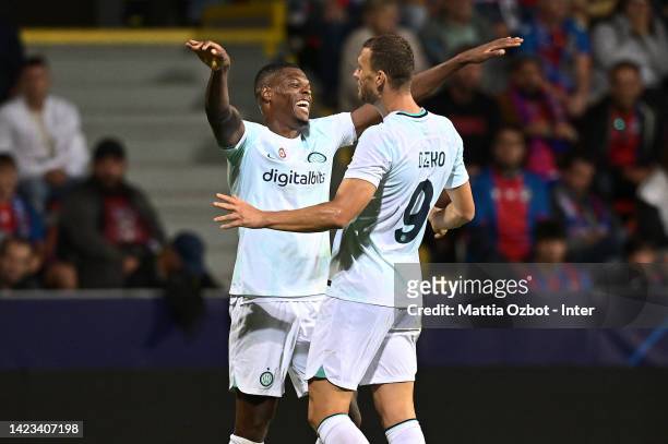 Denzel Dumfries of FC Internazionale celebrates with Edin Dzeko after scoring the goal during the UEFA Champions League group C match between...