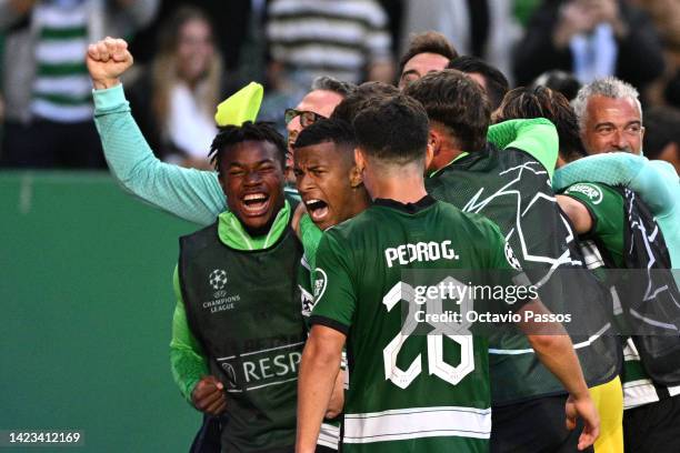 Arthur Gomes of Sporting CP celebrates with teammates after scoring their team's second goal during the UEFA Champions League group D match between...