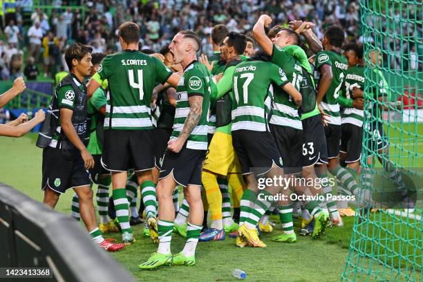 Nuno Santos of Sporting CP celebrates with teammates after Paulinho scored their team's first goal during the UEFA Champions League group D match...