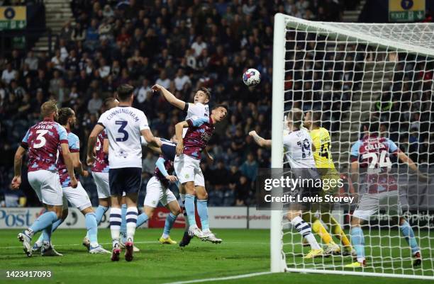 Jordan Storey of Preston North End scores their side's first goal past Arijanet Muric of Burnley during the Sky Bet Championship between Preston...