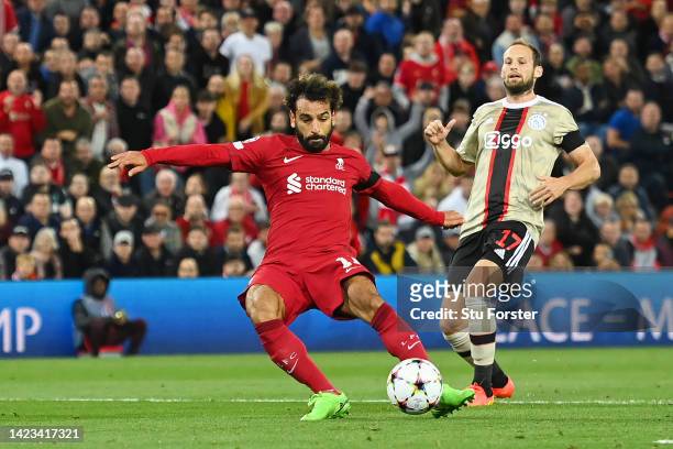 Mohamed Salah of Liverpool scores their team's first goal during the UEFA Champions League group A match between Liverpool FC and AFC Ajax at Anfield...