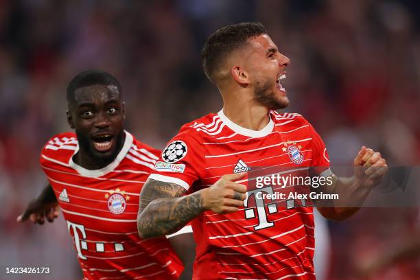 Lucas Hernandez of Bayern Munich celebrates scoring their side's first goal with teammates during the UEFA Champions League group C match between FC...