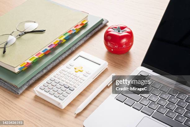 pomodoro timer focus improve work efficiency, pomodoro method - handbook stock pictures, royalty-free photos & images