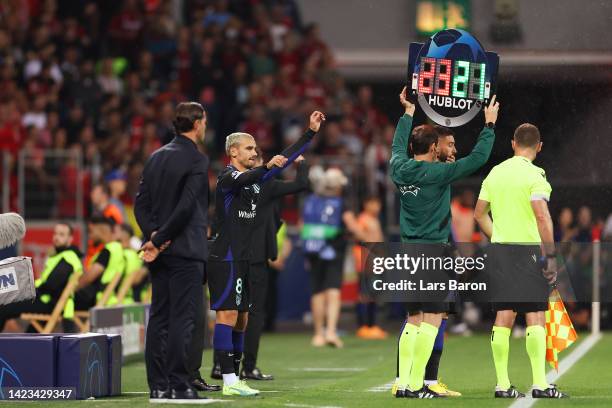 Antoine Griezmann of Atletico de Madrid prepares to be substituted on during the UEFA Champions League group B match between Bayer 04 Leverkusen and...