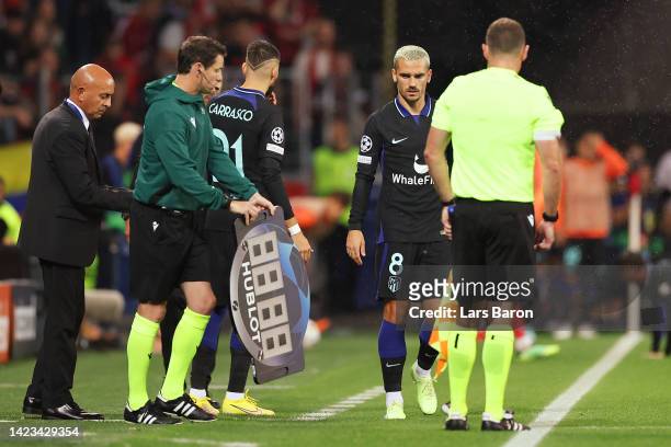Antoine Griezmann of Atletico de Madrid prepares to be substituted on during the UEFA Champions League group B match between Bayer 04 Leverkusen and...