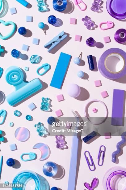 blue and purple color gradient sewing items flat lay on pink - pincett bildbanksfoton och bilder