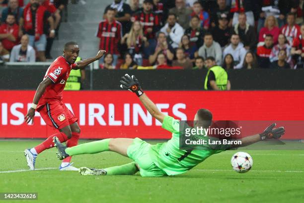 Moussa Diaby of Bayer Leverkusen scores their team's second goal past Ivo Grbic of Atletico de Madrid during the UEFA Champions League group B match...