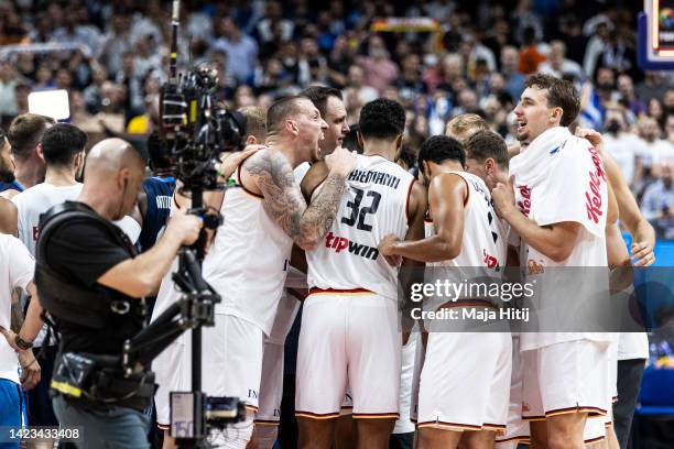 Players of Germany celebrate after winning during the FIBA EuroBasket 2022 quarterfinal match between Germany v Greece at EuroBasket Arena Berlin on...