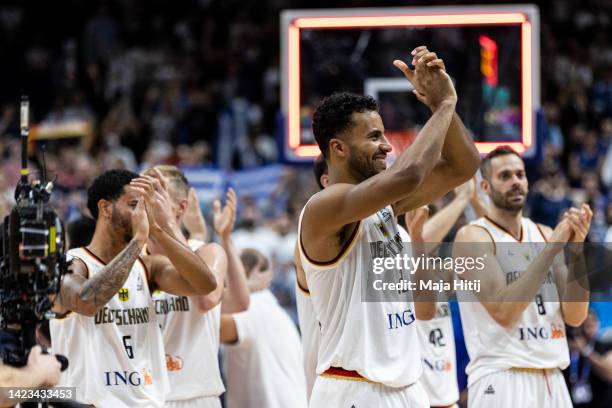 Johannes Thiemann of Germany and players celebrate after the FIBA EuroBasket 2022 quarterfinal match between Germany v Greece at EuroBasket Arena...