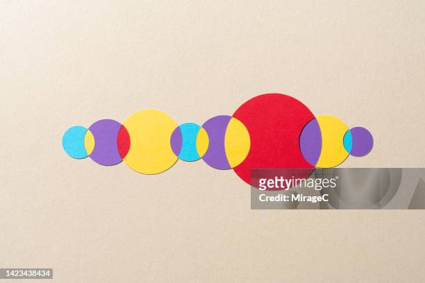 paper craft venn diagram composed of multiple crossing circles - crisscross stock pictures, royalty-free photos & images