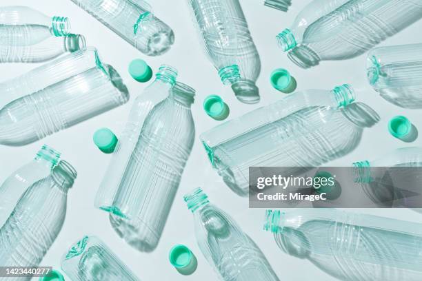 plastic bottles and caps flat lay pattern, recycle concept - plastic pollution stock pictures, royalty-free photos & images