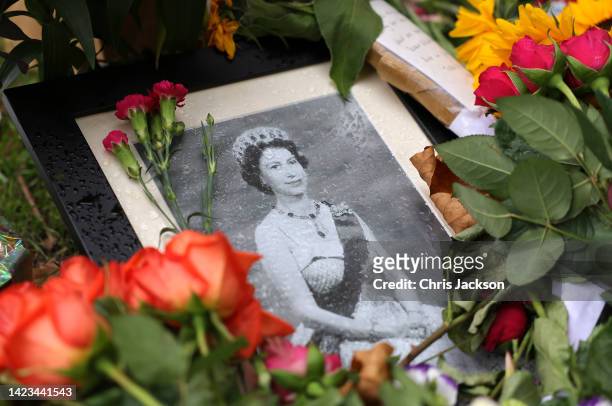 Tributes and flowers in memory of Queen Elizabeth II are seen in Green Park on September 13, 2022 in London, England. Elizabeth Alexandra Mary...