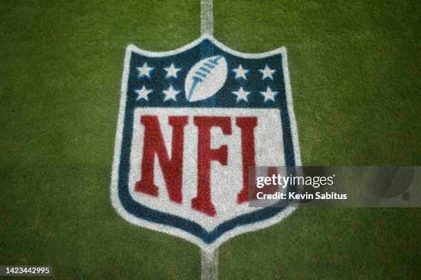 Detail shot of the NFL shield logo painted on the grass prior to an NFL football game between the New York Giants and the Tennessee Titans at Nissan...