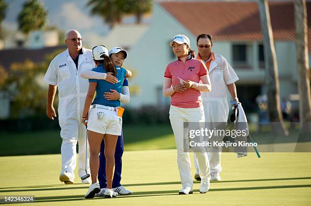 Kraft Nabisco Championship: South Korea I.K. Kim upset, hugging Eun Hee Ji, with Hee Kyung Seo after missing putt on No 18 hole during Sunday play at...