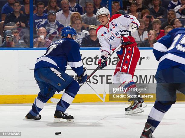 Alex Ovechkin of the Washington Capitals passes the puck against Brett Clark of the Tampa Bay Lightning during the second period at the St. Pete...