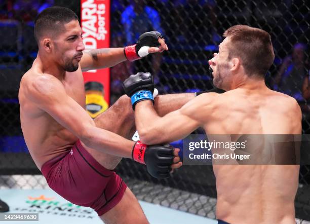 Daniel Marcos of Peru kicks Brandon Lewis in a bantamweight fight during Dana White's Contender Series season six, week eight at UFC APEX on...