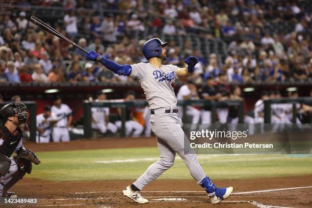 Joey Gallo of the Los Angeles Dodgers hits a two-run home run against the Arizona Diamondbacks during the second inning of the MLB game at Chase...