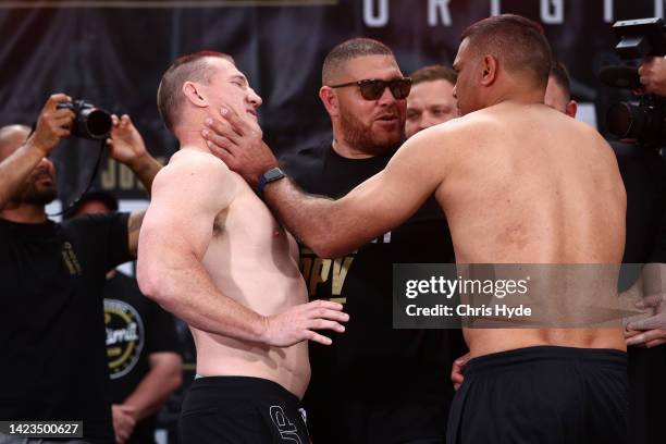 Paul Gallen and Justin Hodges during the official weigh in at King George Square, on September 14, 2022 in Brisbane, Australia.