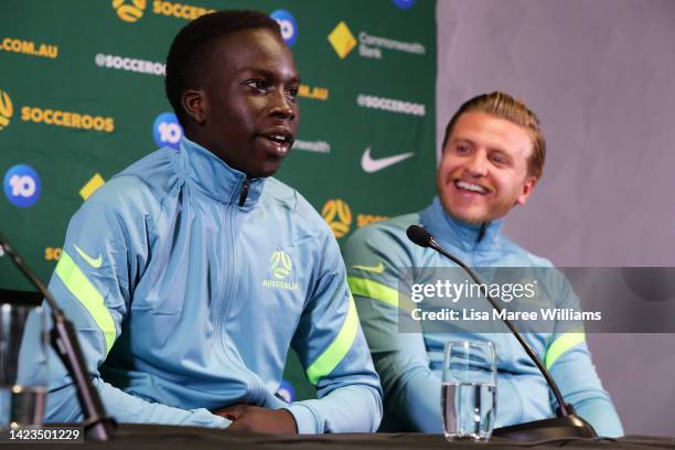 Players Garang Kuol and Jason Cummings speak with the media during a Socceroos squad announcement and press conference at Dexus Place on September...