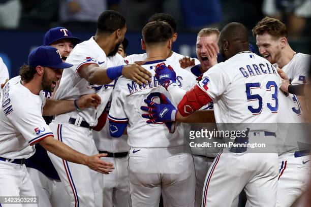 Mark Mathias of the Texas Rangers celebrates after hitting a walk-off home run against the Oakland Athletics in the bottom of the ninth inning at...