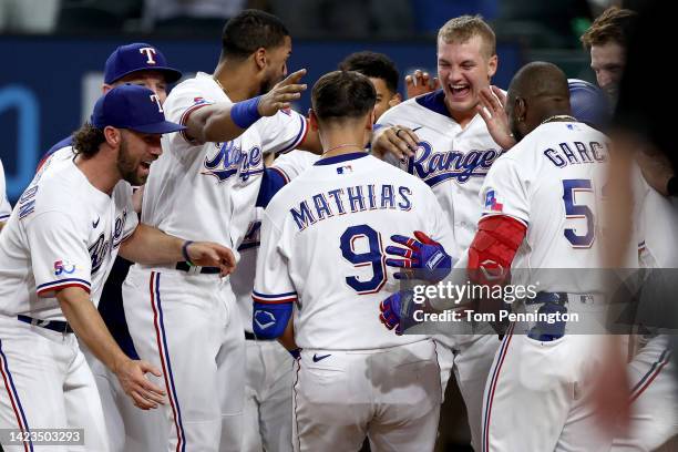 Mark Mathias of the Texas Rangers celebrates after hitting a walk-off home run against the Oakland Athletics in the bottom of the ninth inning at...